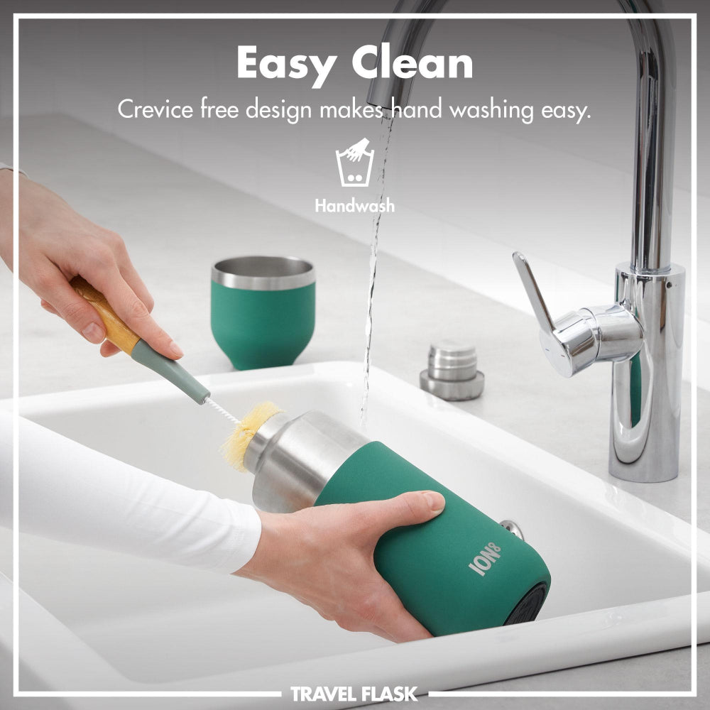 Teal travel flask with cleaning brush being used in a sink, labeled 'Easy Clean' and 'Travel Flask'.