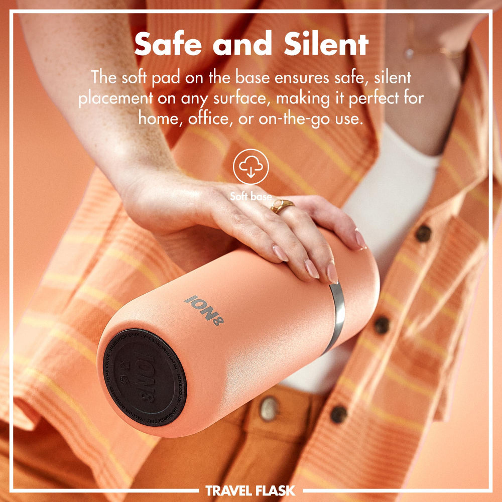 ION8 Travel flask with soft pad base held by a person, text about safety and silence.