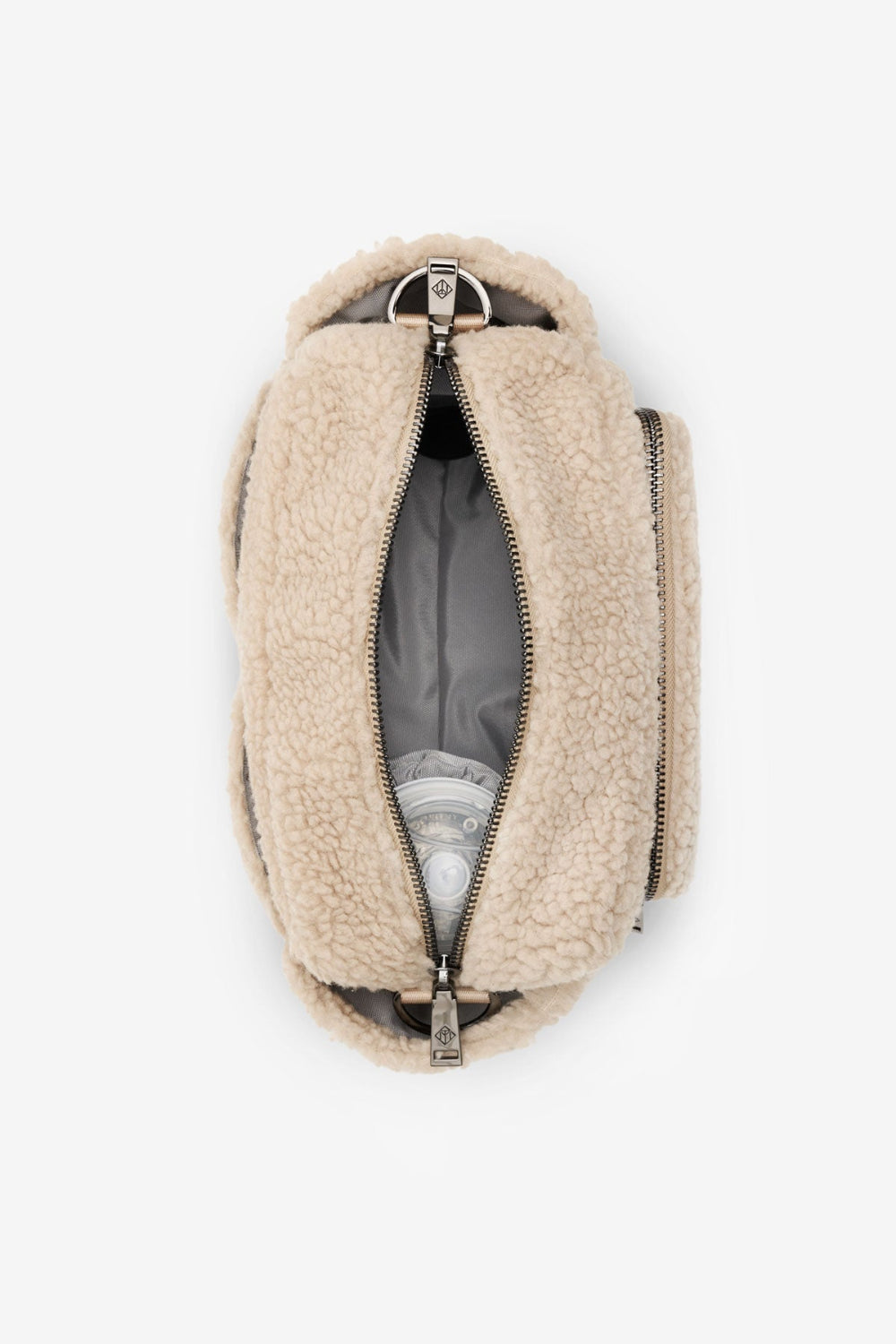 Beige fleece crossbody bag with zipper on a white background