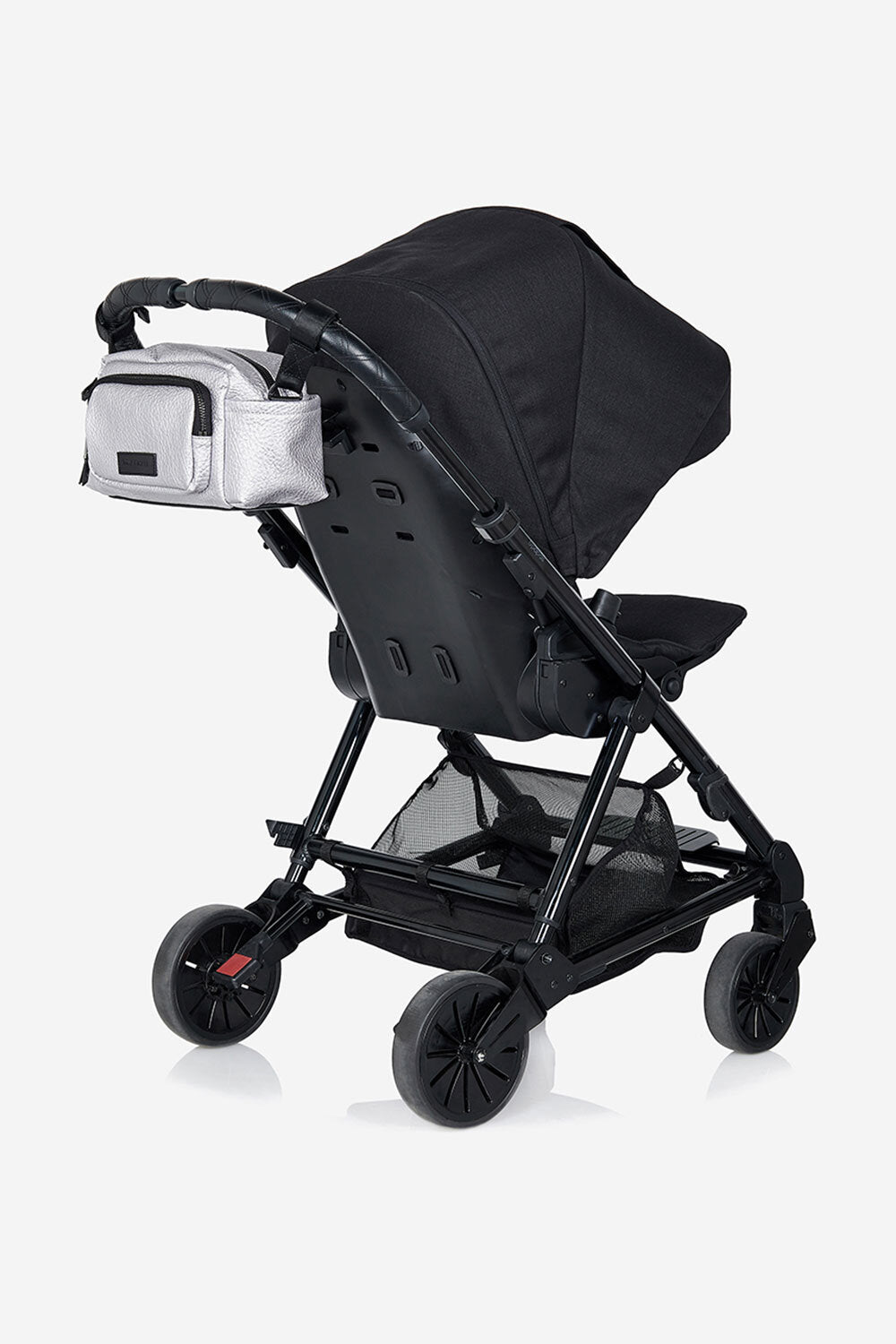 Black baby stroller with a Silver bag attached on a white background