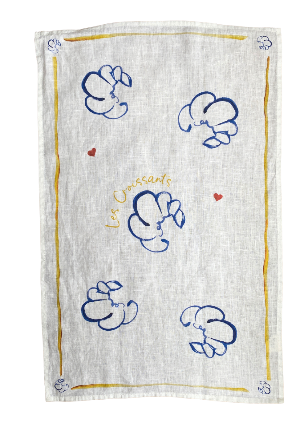 Towel with blue croissant icons and 'Les Croissants' text on a white background