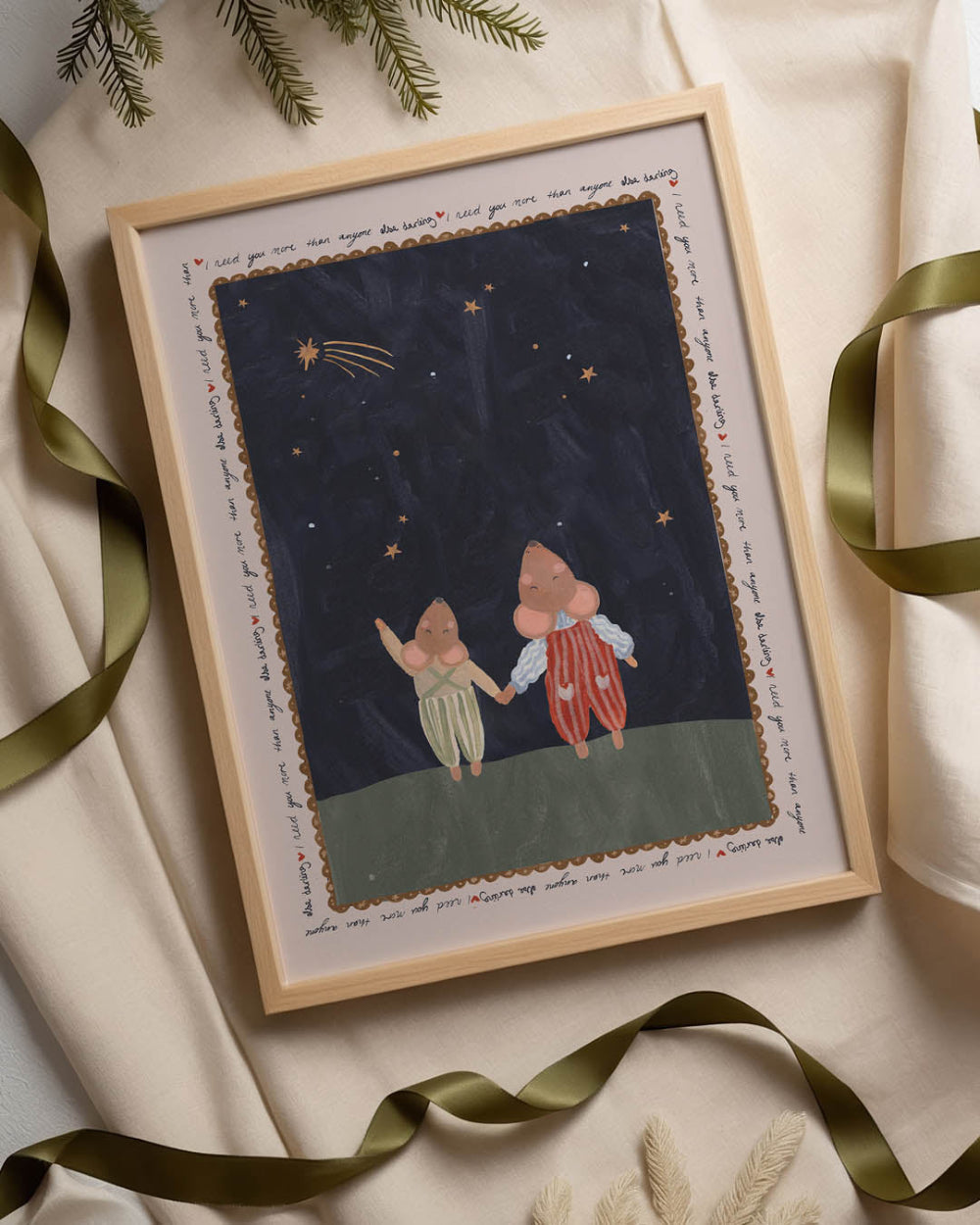 Framed artwork of two mice holding hands under a starry sky, surrounded by green ribbons and decorative elements.