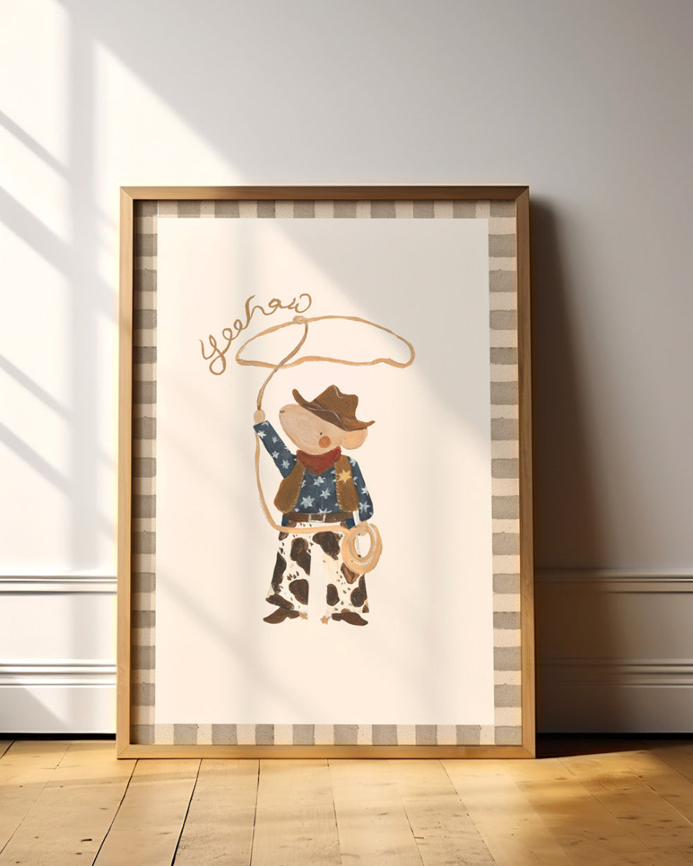 Framed artwork of a Mouse cowboy holding a lasso on a checkered background