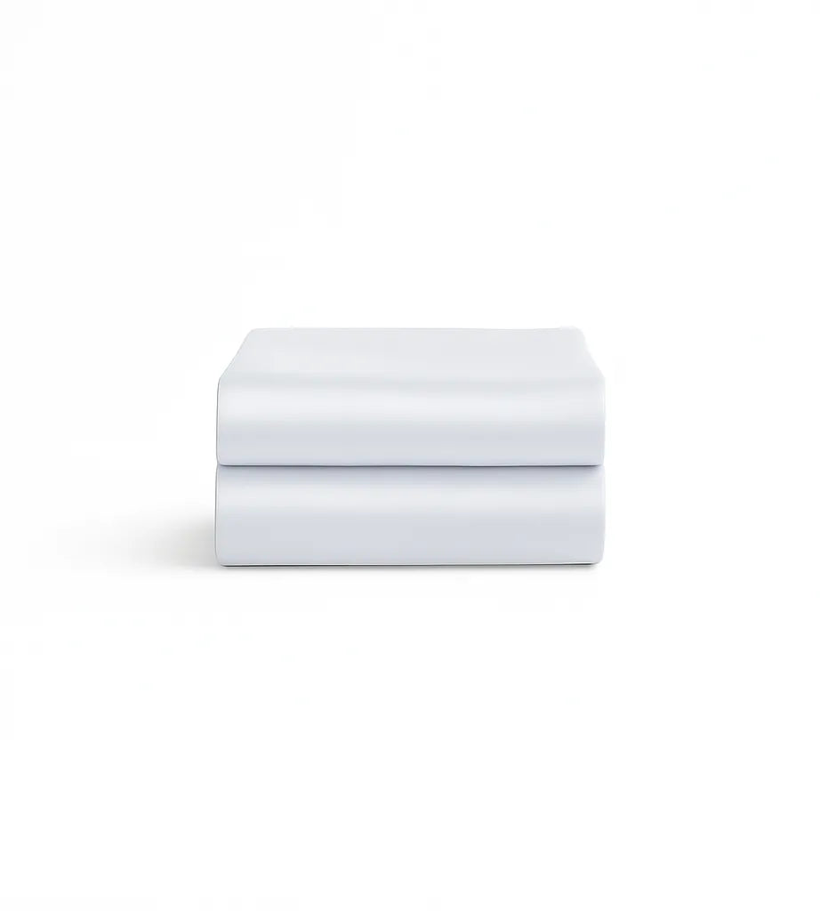 Folded bamboo pillowcases on a white background