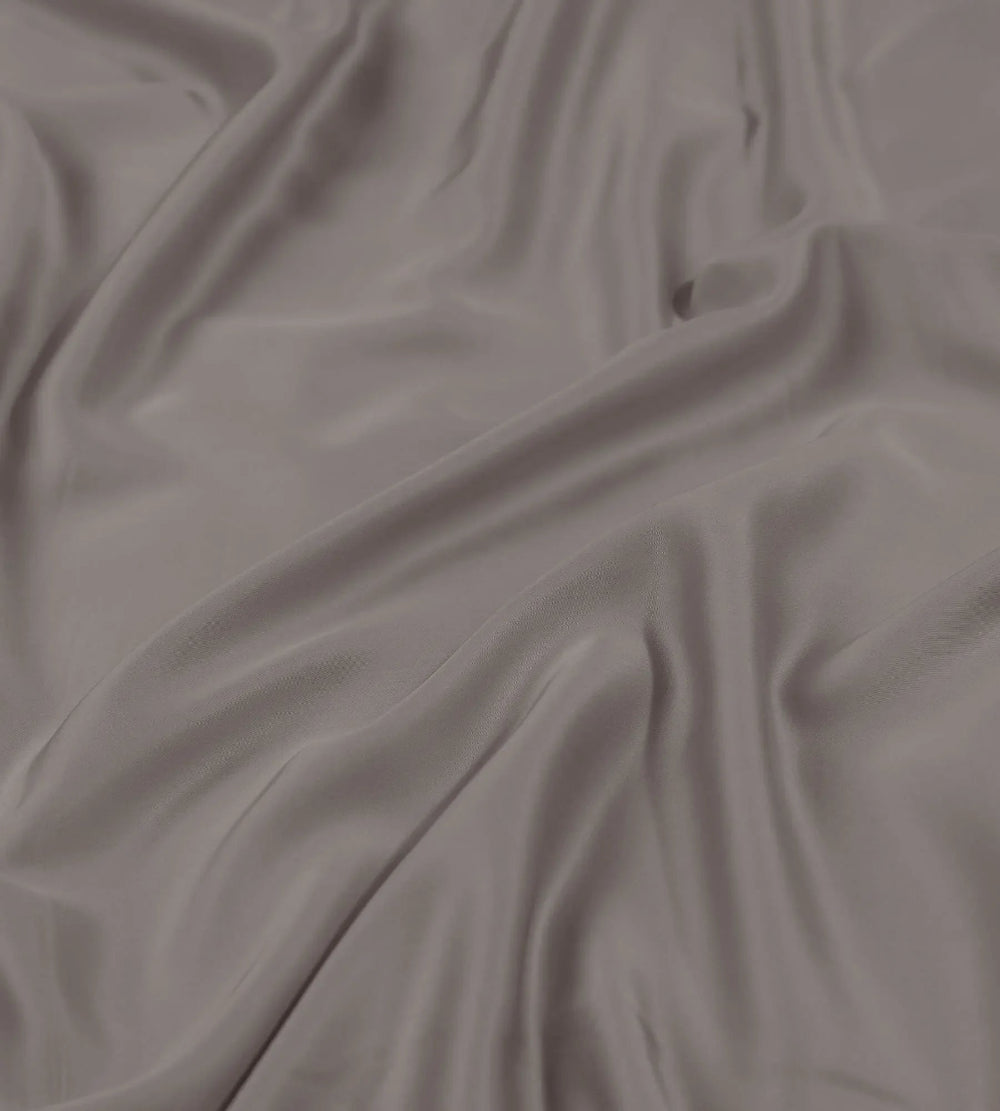 Close-up of grey fabric with visible texture