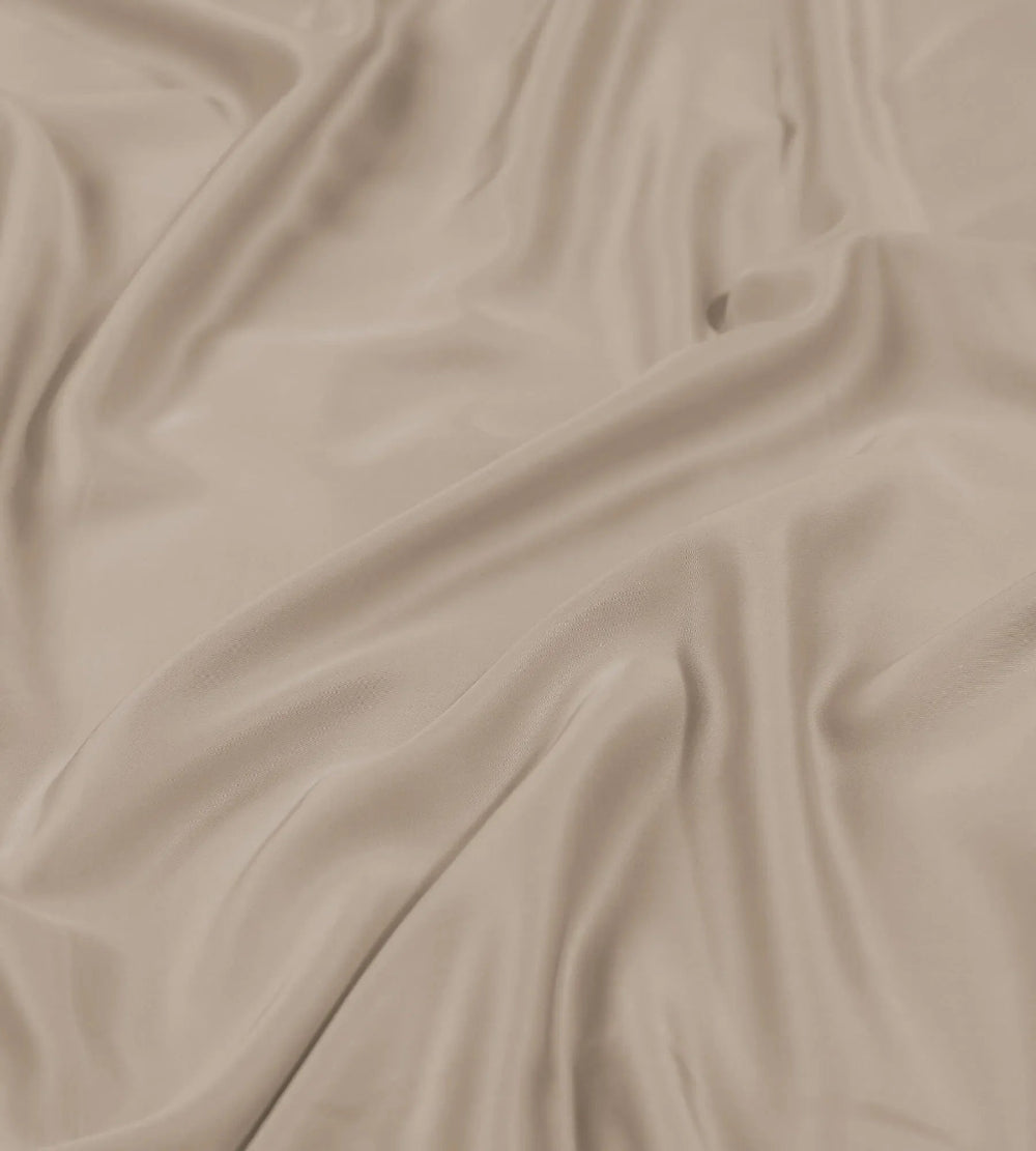 Oatmeal bedding set closeup with folds