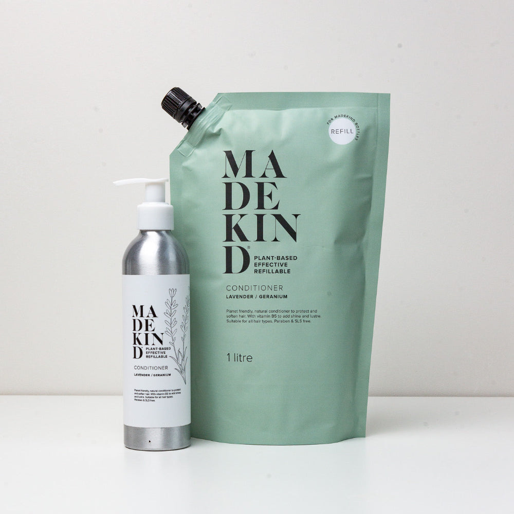 Made Kind conditioner refillable Pouch and bottle and packaging on a white background 