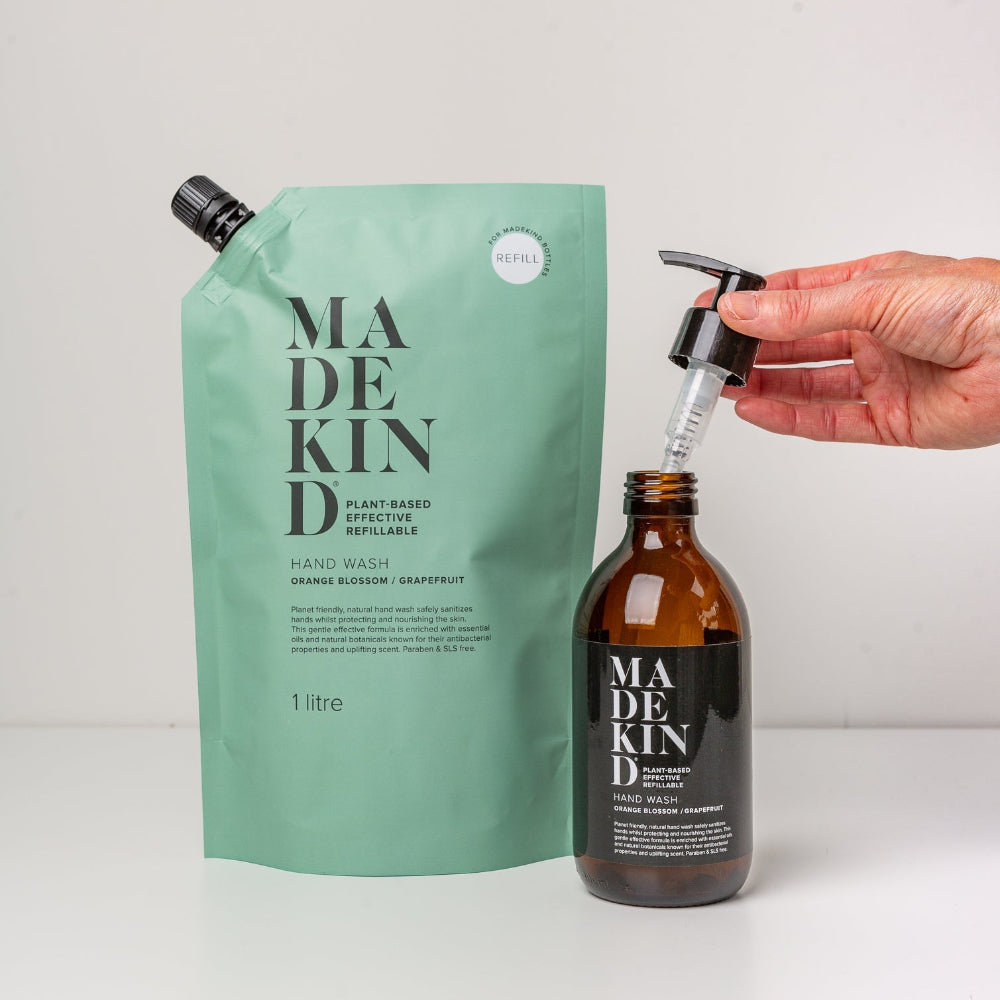 Madekind hand wash refill pouch and bottle on a white background