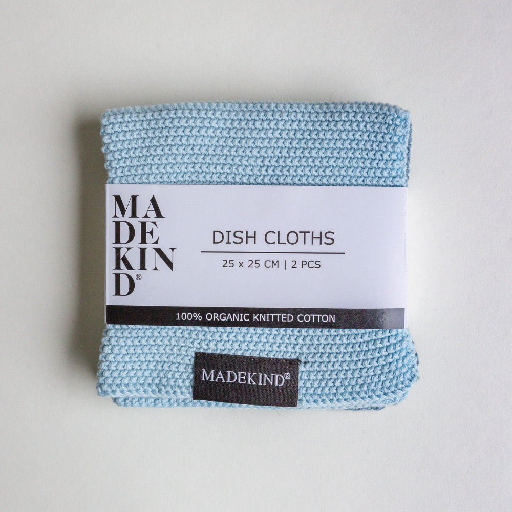 Pack of light blue dish cloths with 'MADEKIND' label on a light gray background
