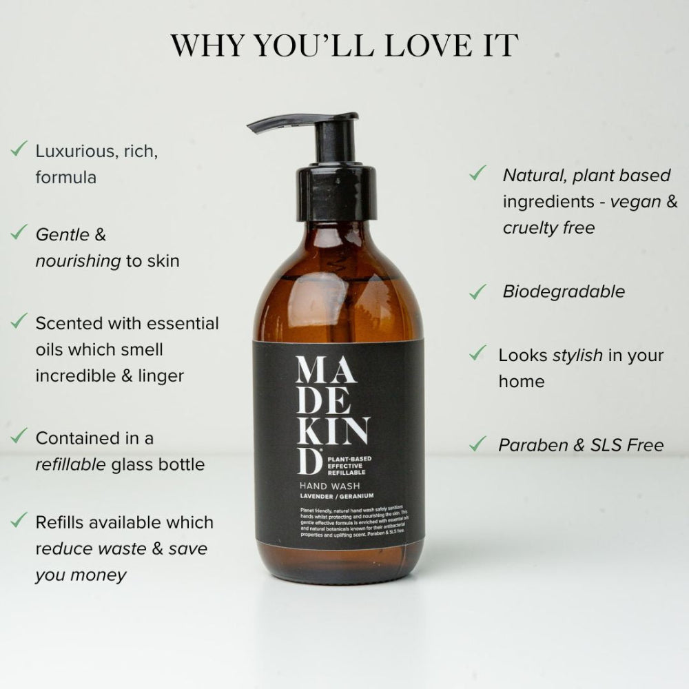 Brown bottle of hand wash with black label on a white background, featuring text about product benefits.