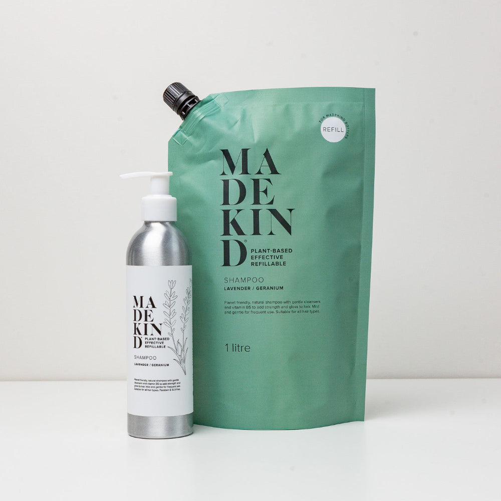 Madekind shampoo bottle and refill pouch on a white background