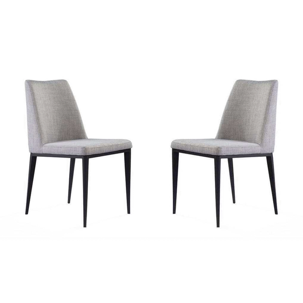 Medici set of two grey upholstered dining chairs on a white background