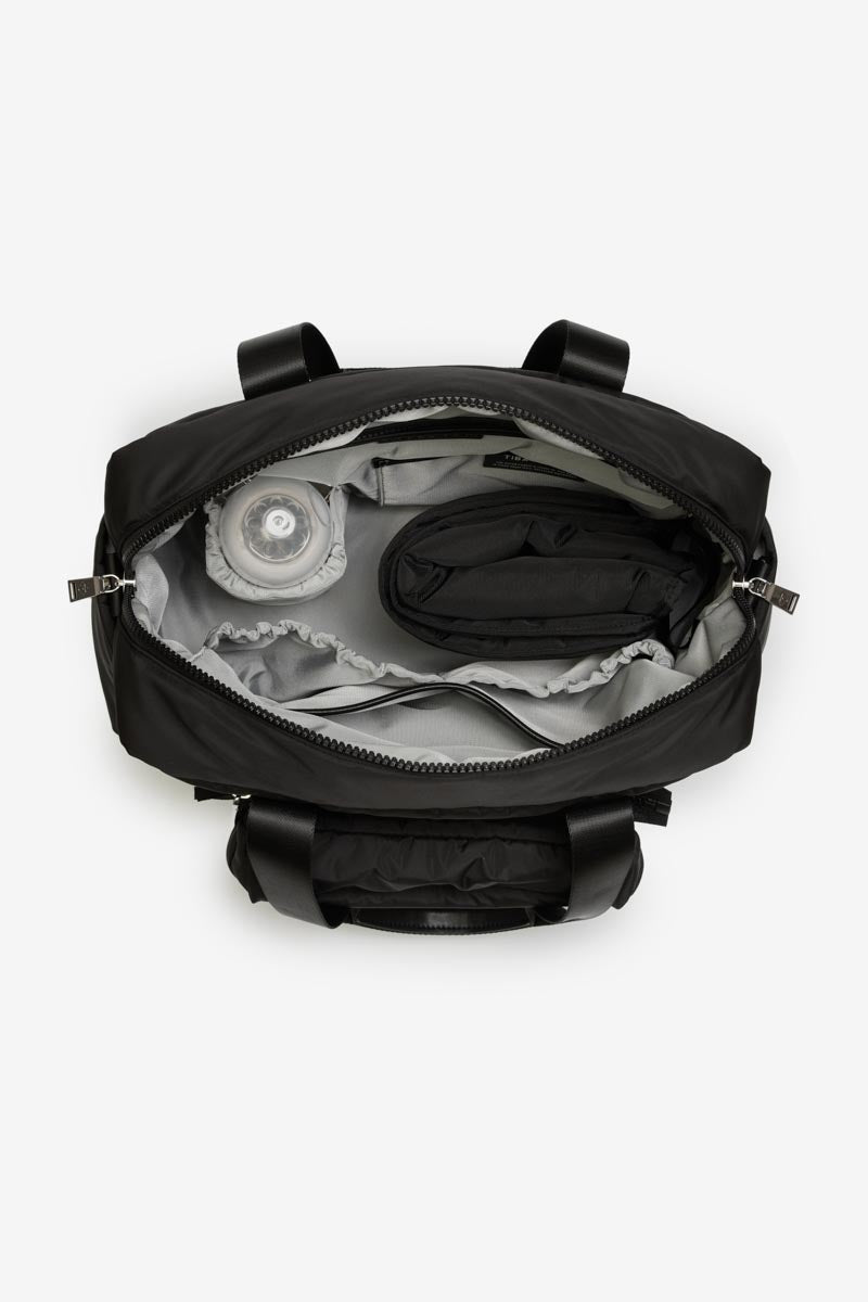 Black backpack with compartments on a white background