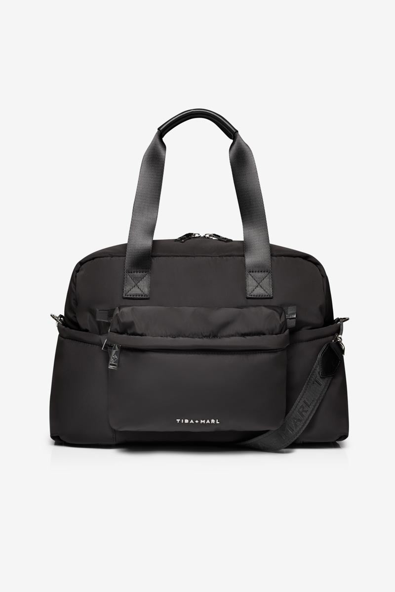 Black duffel bag with shoulder strap on a white background