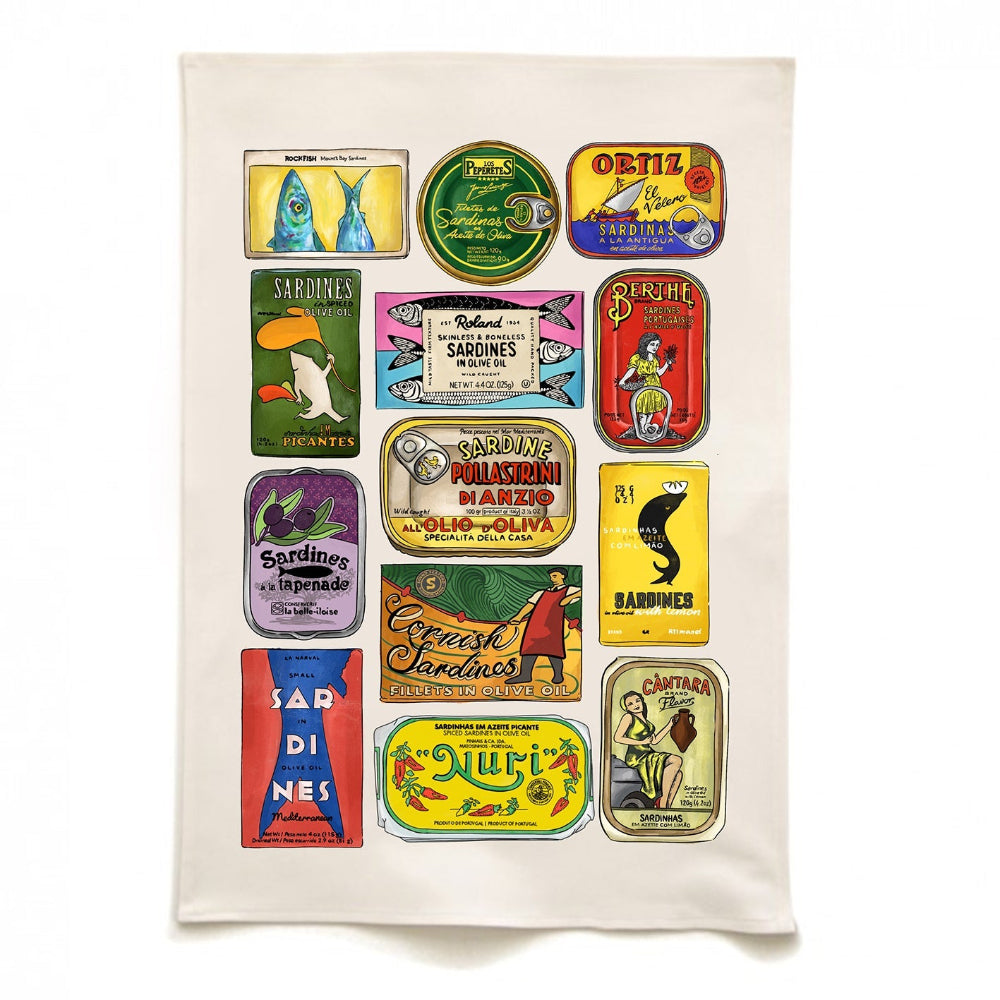 Towel with vintage-style sardine can labels on a white background