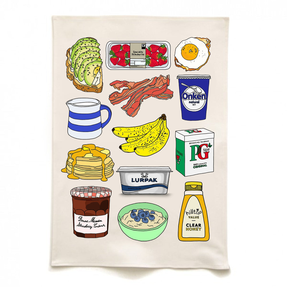 Tea towel with illustrations of breakfast items on a white background
