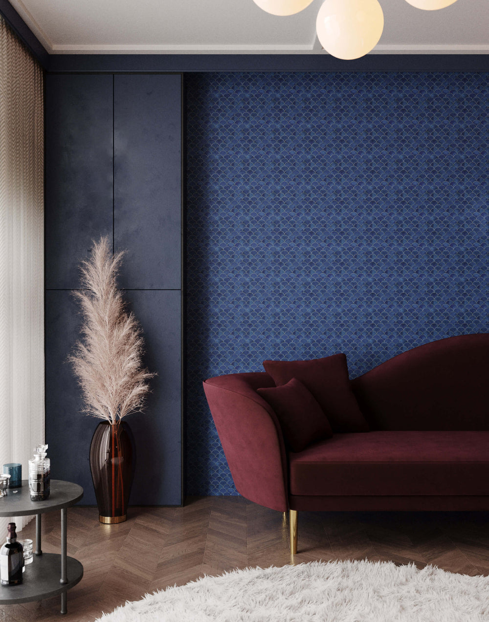 Modern living room with a dark blue wall, burgundy sofa, and decorative elements.