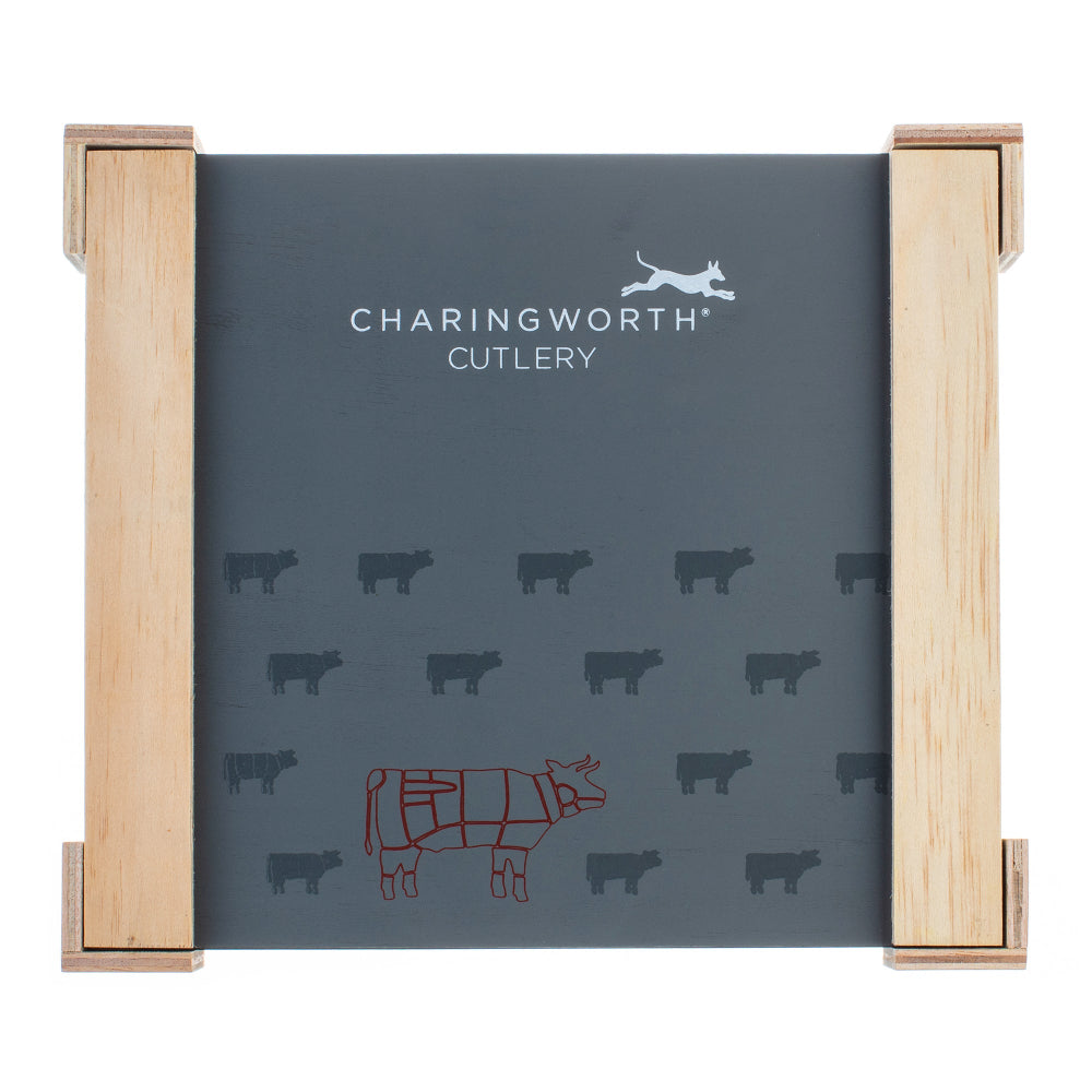 Charingworth Cutlery packaging with cow illustrations on a grey background