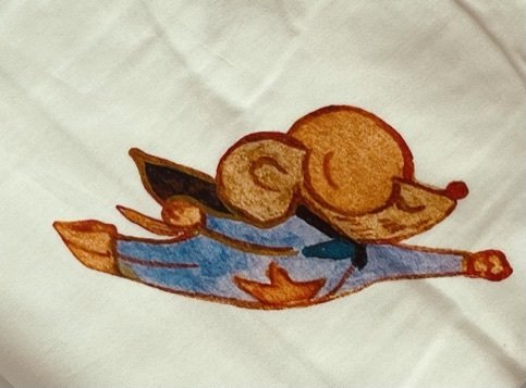 Mighty Mouse a cartoon character on a white pillowcase 