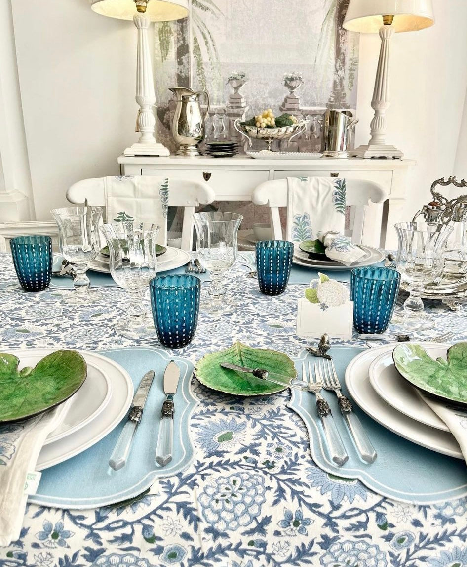 Elegant dining table setting with blue and white decor