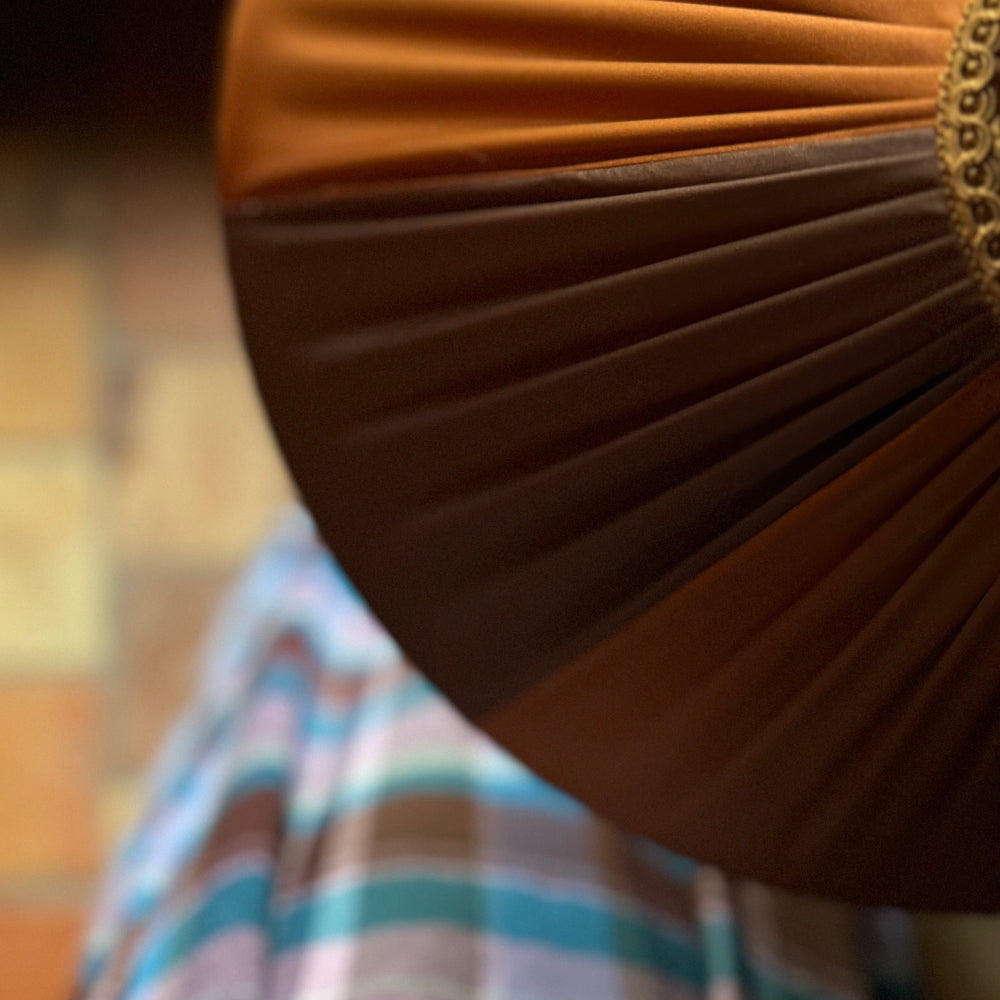 Close-up of a pleated fabric with a blurred background