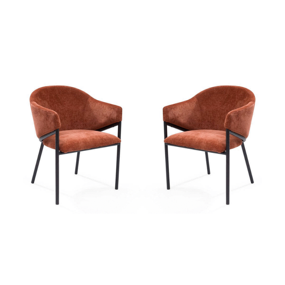 Two Tommy Franks Rust brown chairs with black frames on a white background