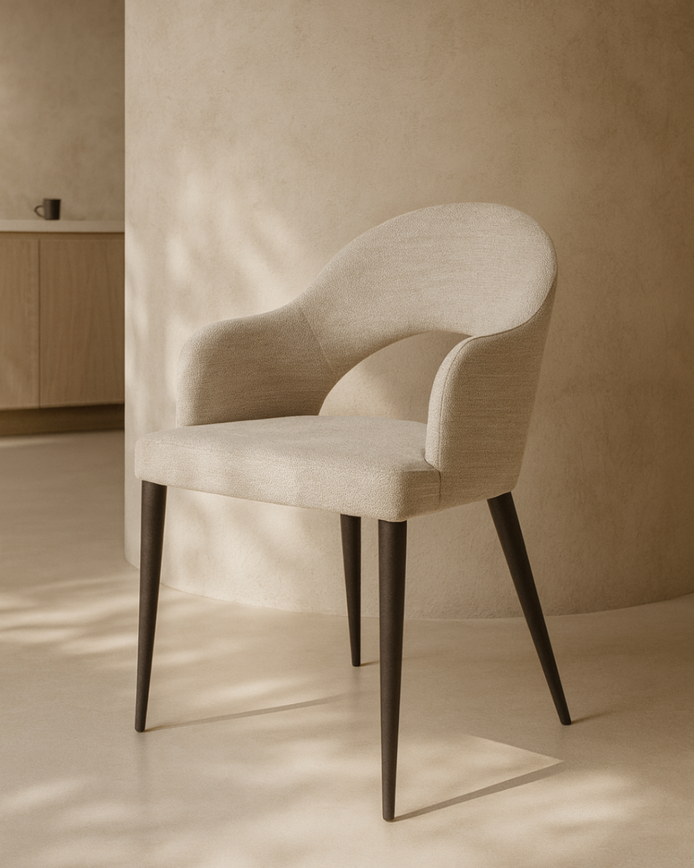 Tommy Franks Jiva Dining chair Beige with dark legs in a minimalistic room.