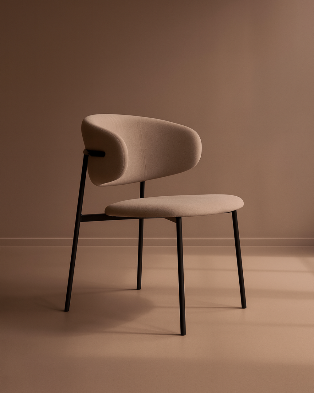 Tommy Franks Modern dining chair with a curved backrest and black legs on a plain background