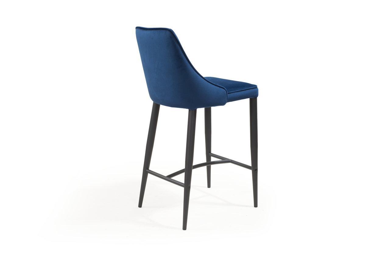 Tommy Franks Velvet Blue bar stool with black legs on a white background
