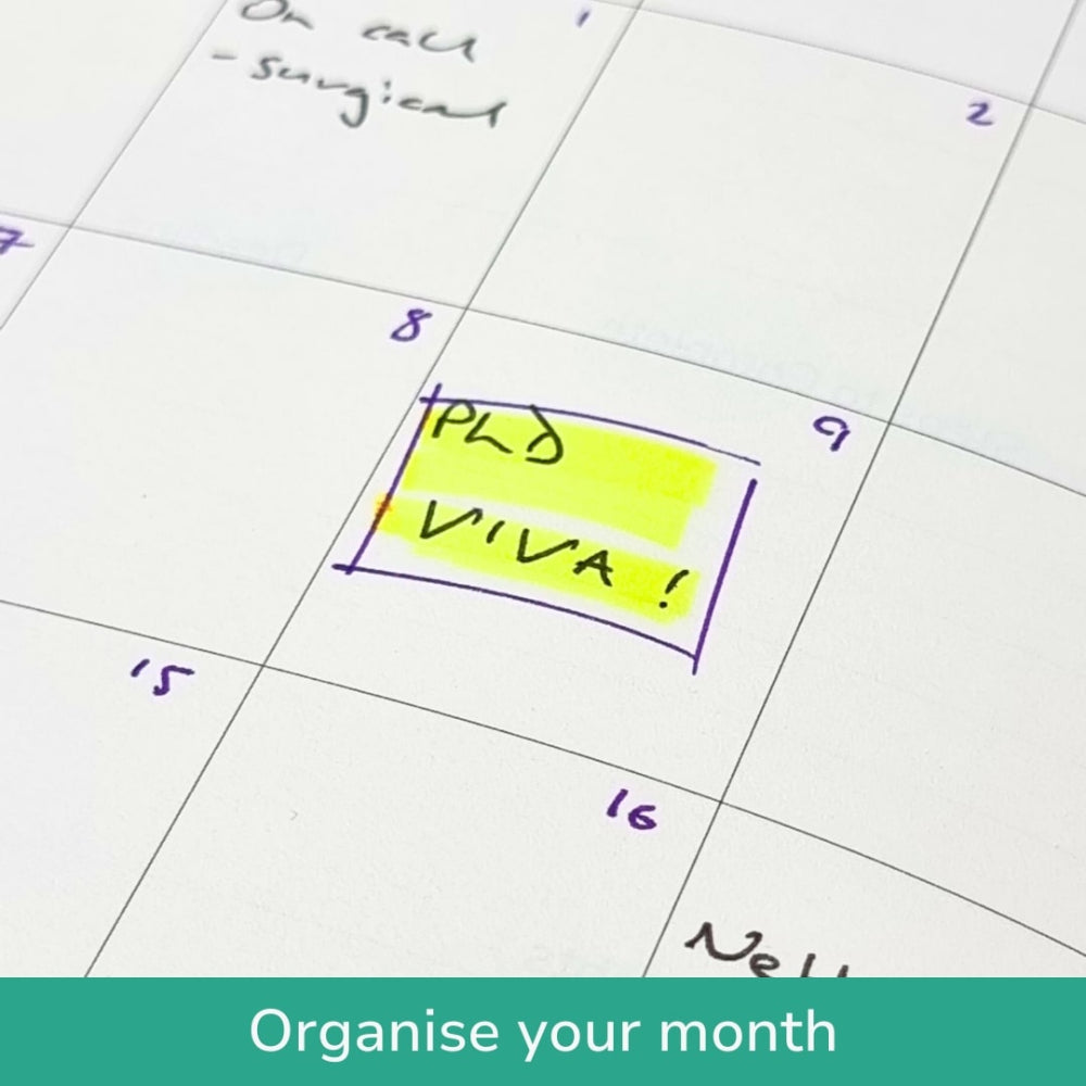 A5 Productivity notebook Calendar with sticky notes indicating important dates, with a focus on organisation.
