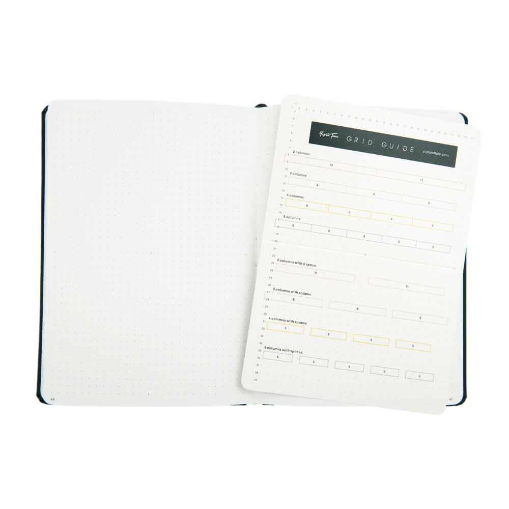 Yop and Tom White notebook with grid guide on a white background