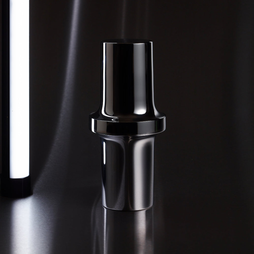 Aaron Probyn BARBICAN cocktail shaker in polished stainless steel showing its reflective sculptural form