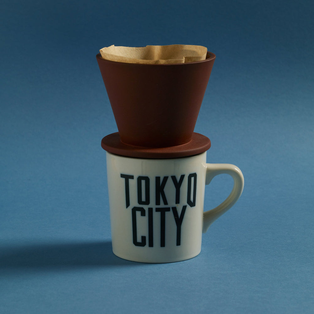 Aaron Probyn COLOMBO ceramic coffee dripper on a white Tokyo City coffee mug
