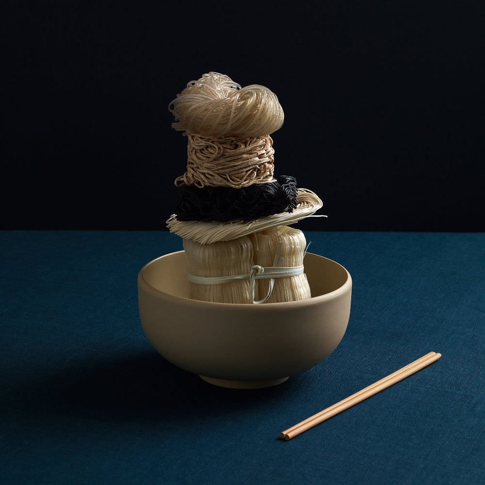Oat COLOMBO ramen bowl by Aaron Probyn with a tall arrangement of noodles