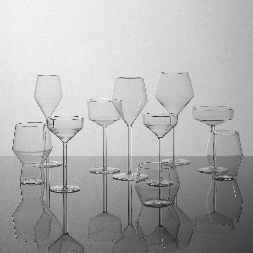 Collection of clear Aaron Probyn JUNIPER glasses with geometric bowls in assorted shapes and sizes
