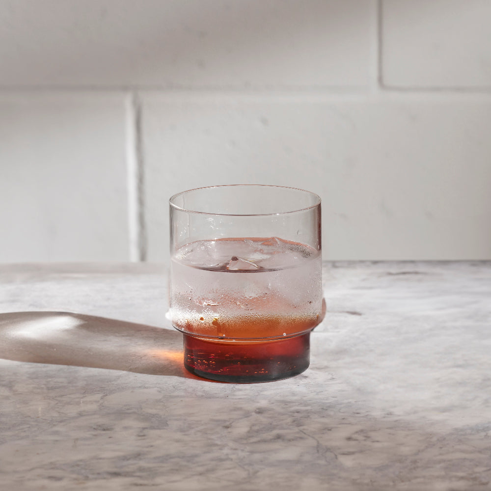 Aaron Probyn RYE drinking glass with clear body and amber-coloured base