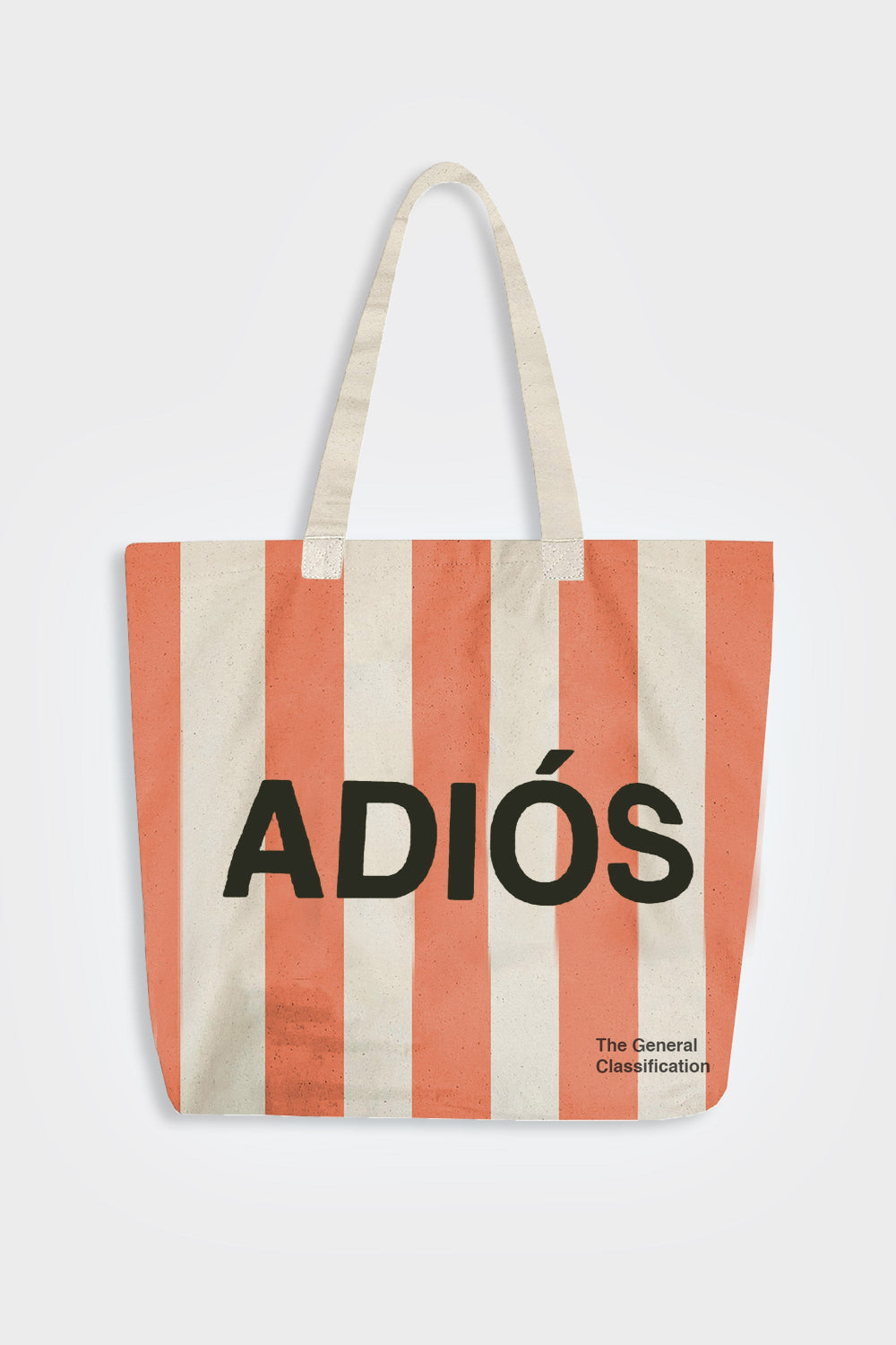 A canvas tote bag with vertical coral orange and cream stripes, featuring the word 'ADIÓS' in bold black letters across the front and 'The General Classification' printed in small black text at the bottom right.