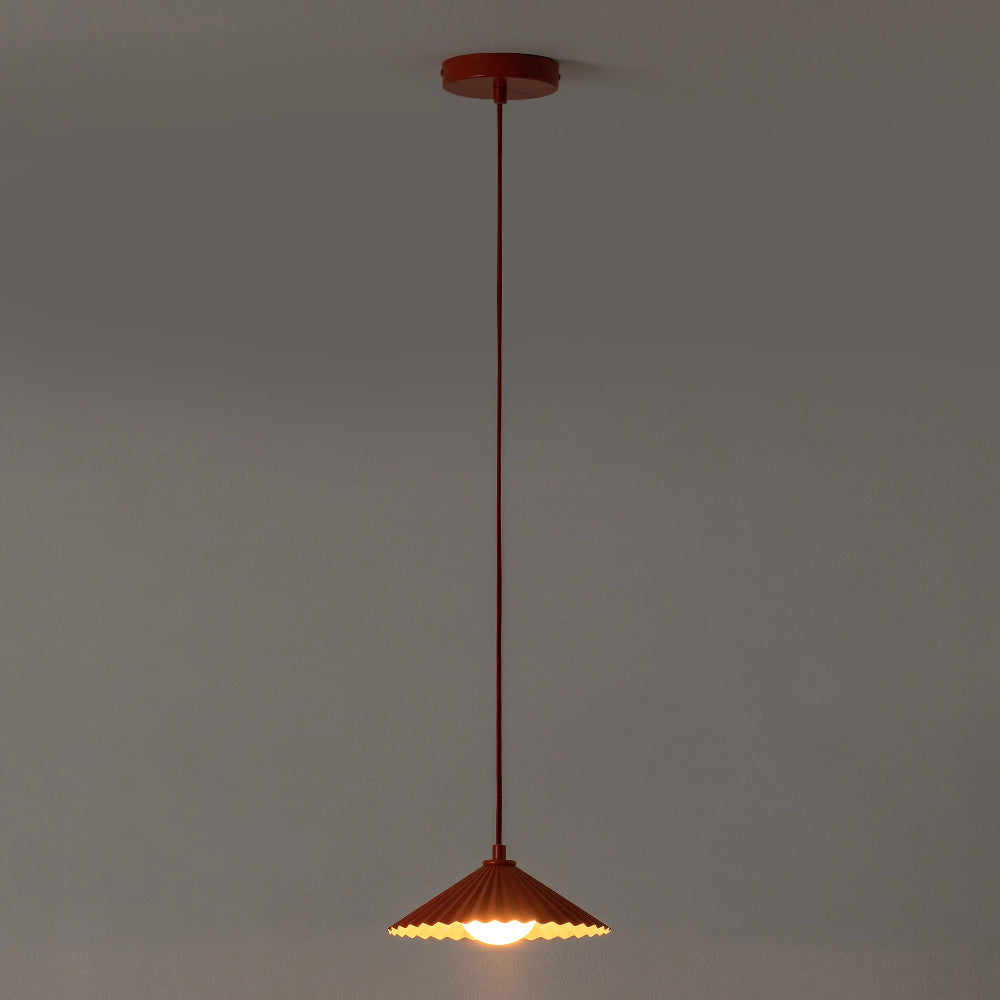 Adjustable burnt orange pendant light with long ceiling drop
