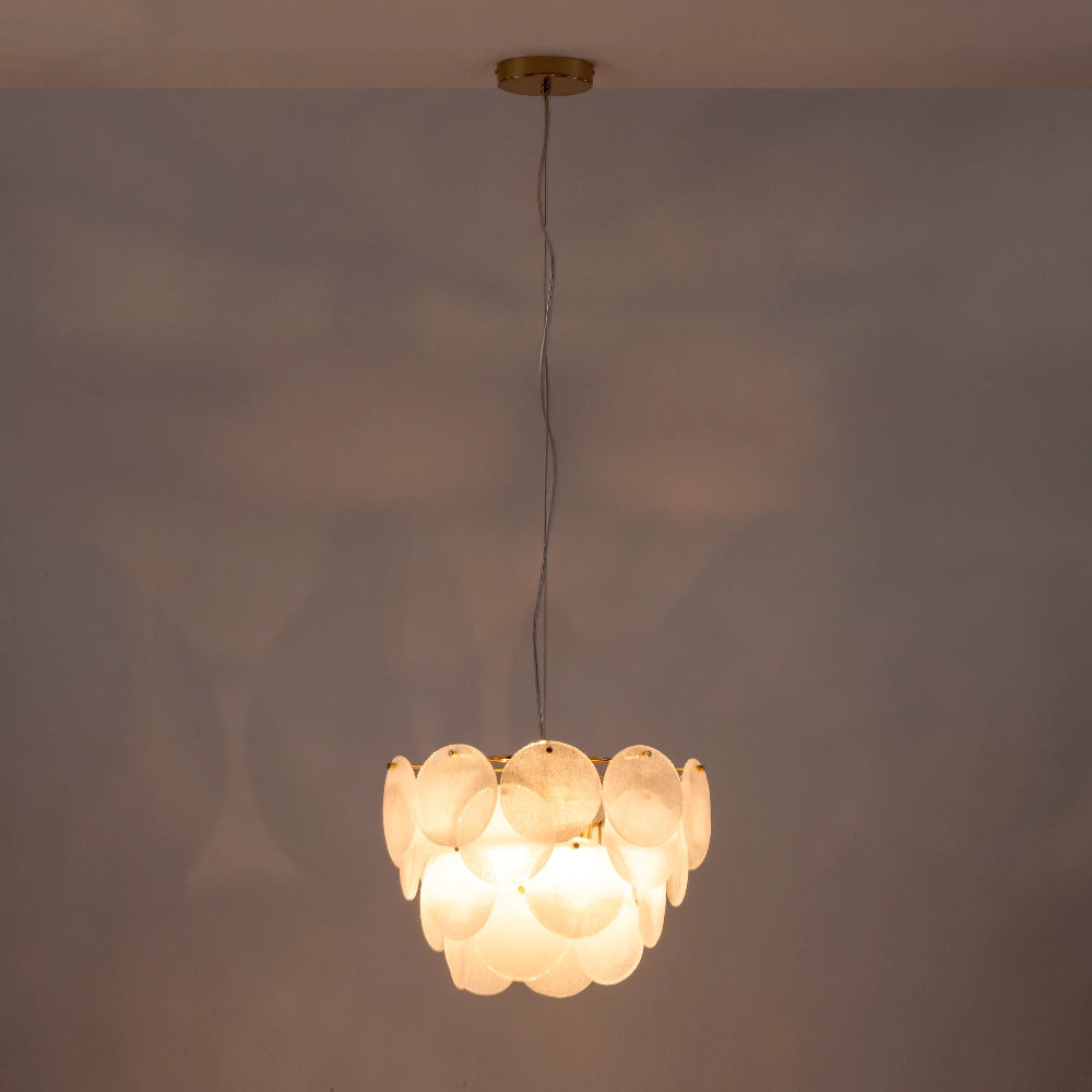 Adjustable white glass chandelier suspended from the ceiling lit
