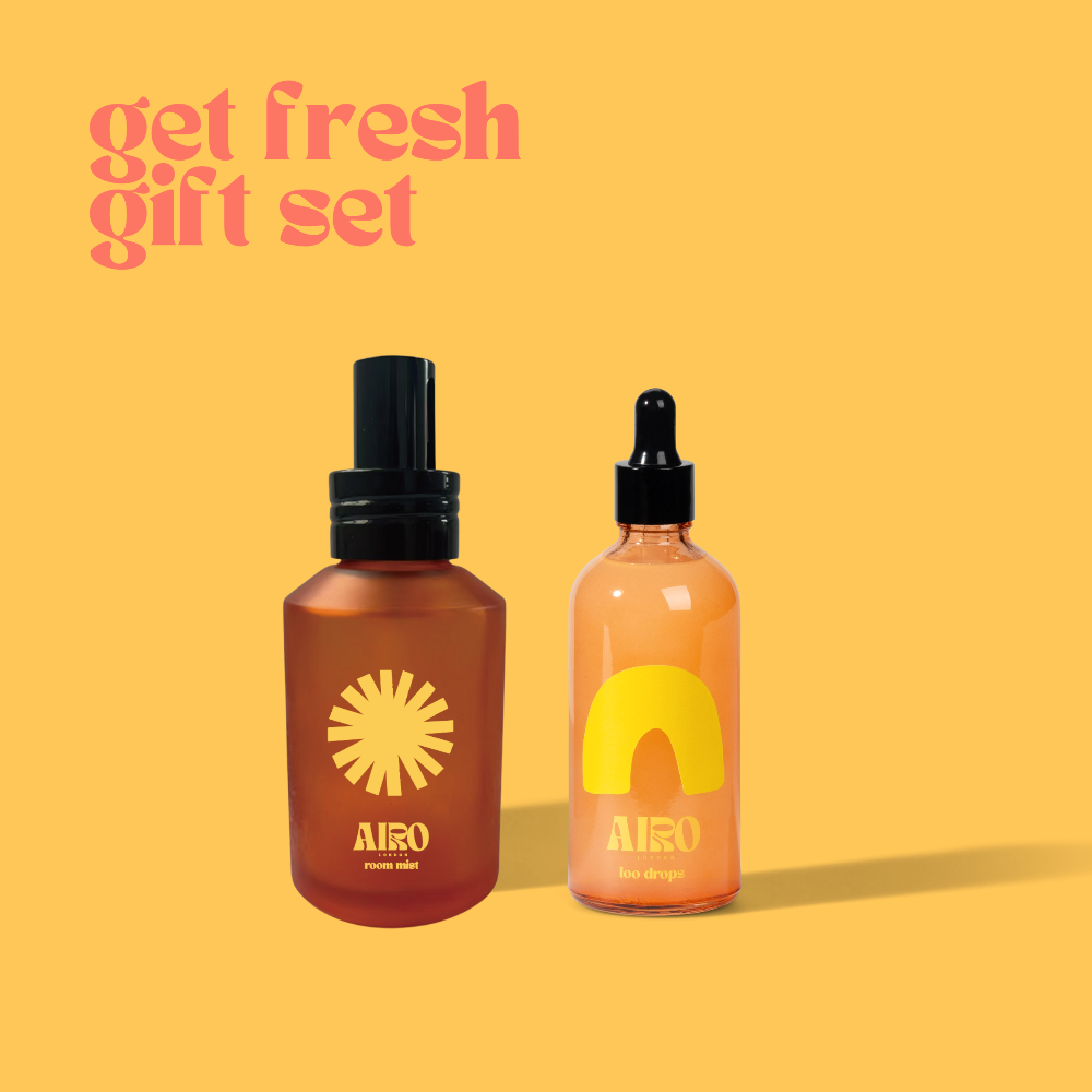 Two fragrance bottles with 'Airo' branding on a yellow background, labelled 'get fresh gift set'.