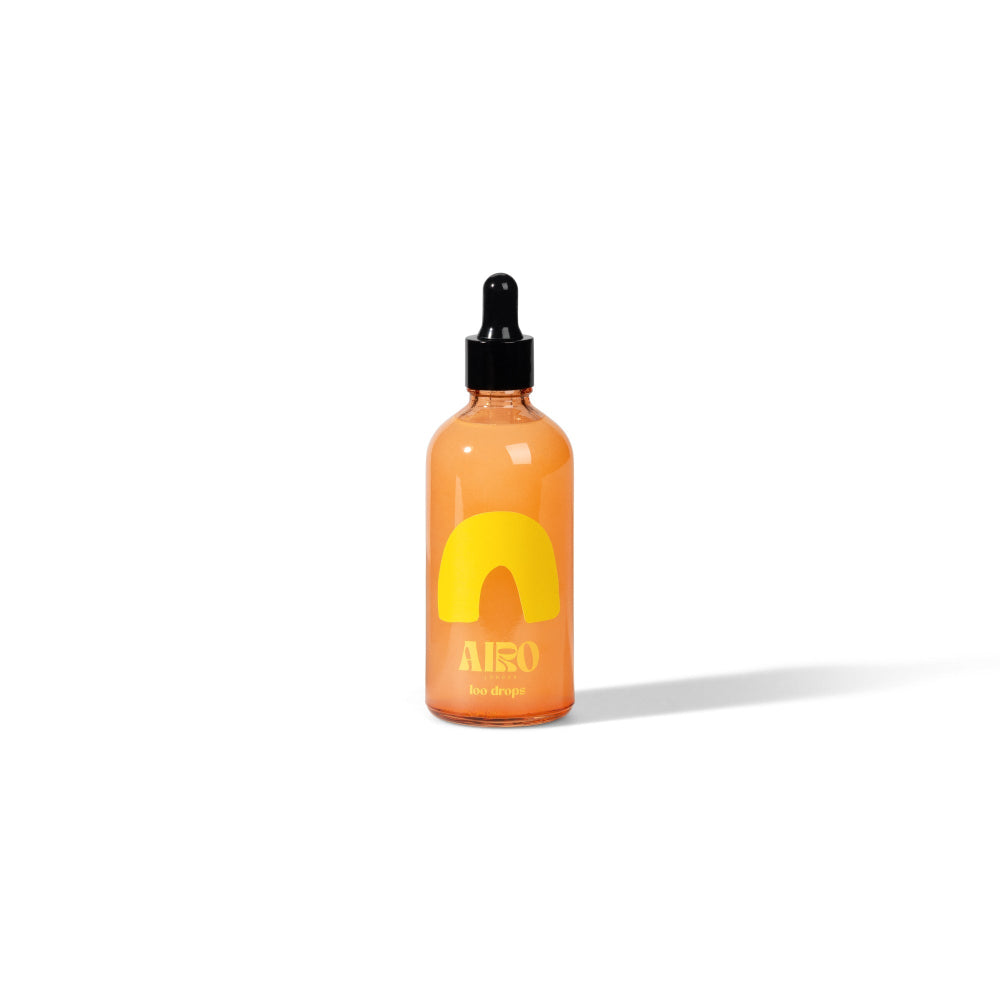 airo toilet fragrance loo drops orange bottle on a white background