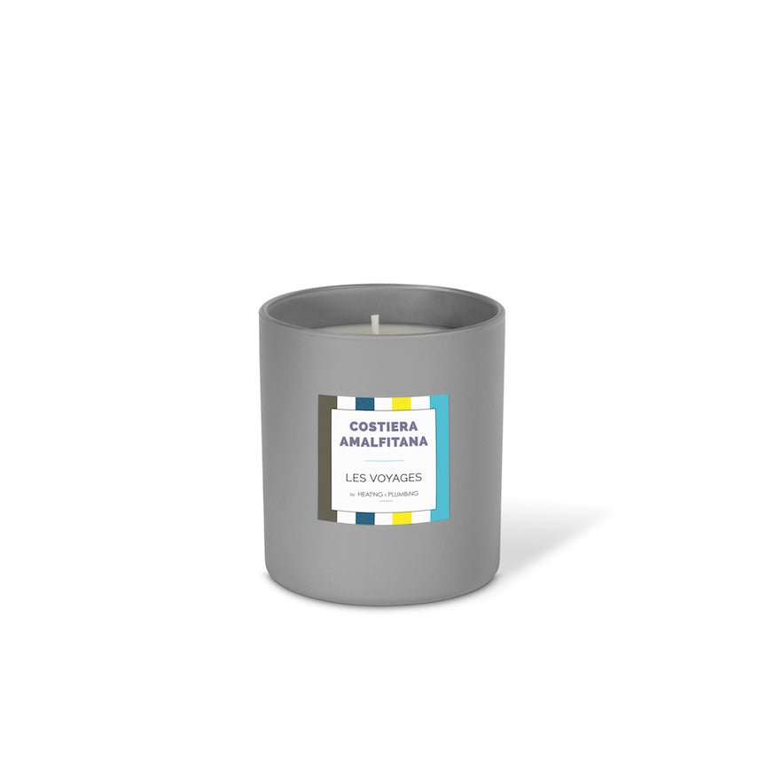 Grey candle with a label on a white background