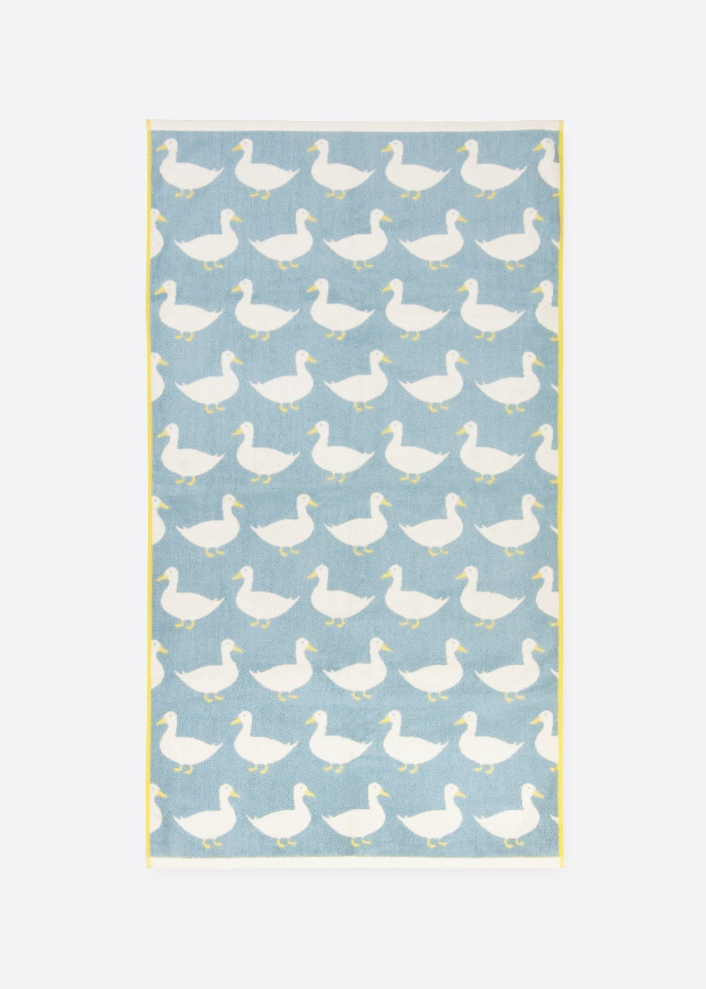 Tea towel with duck pattern on a light blue background