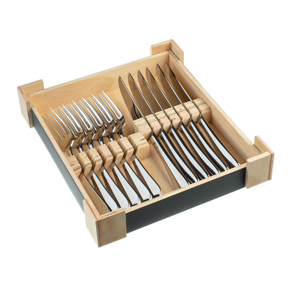 Set of silver steak knife and fork cutlery in a wooden box on a white background