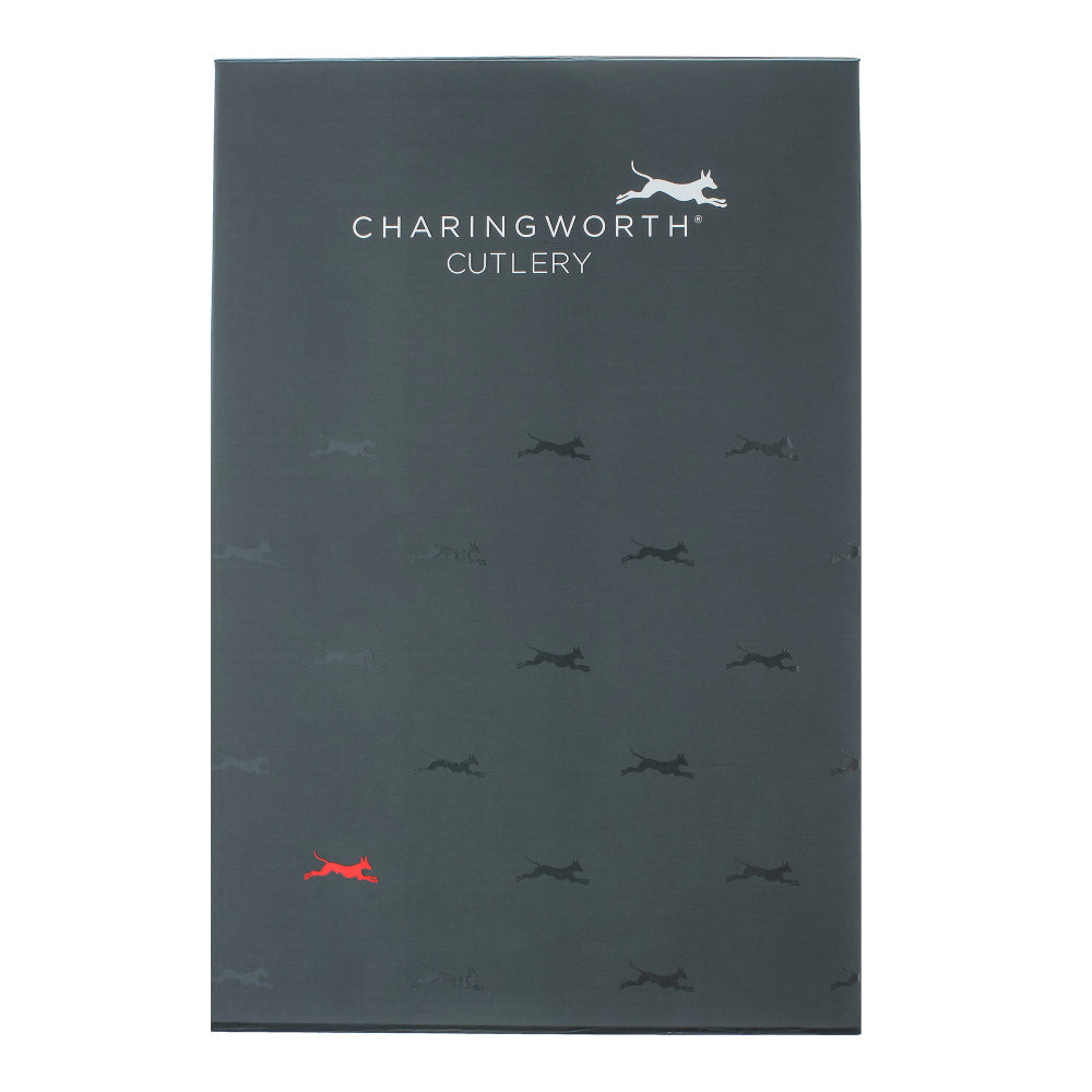 Charingworth Cutlery packaging with a pattern of dogs on a dark background