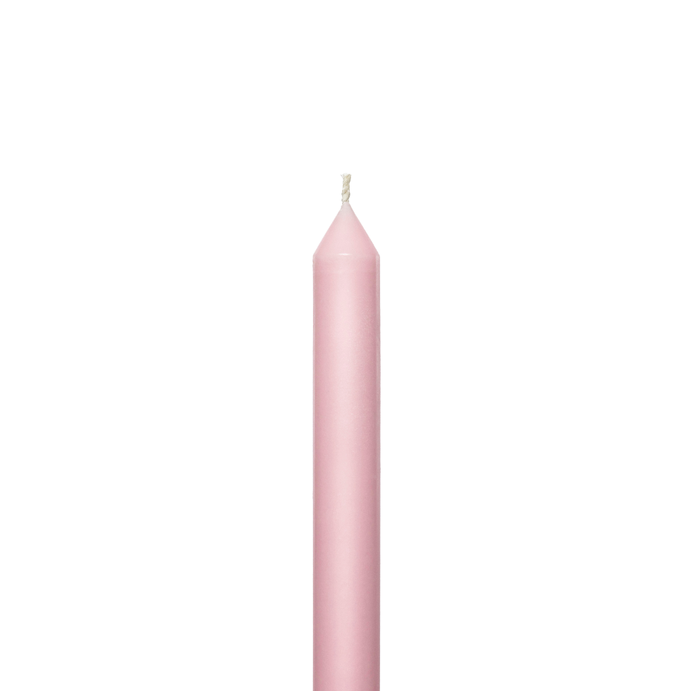 Pink candle on a white background