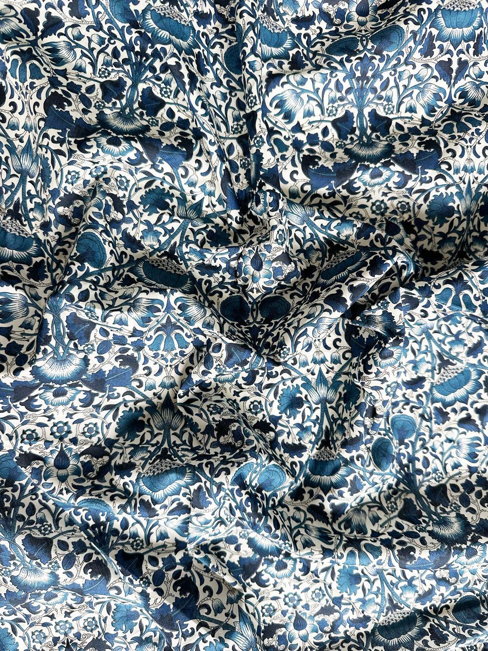 Close-up of Liberty blue and white floral patterned fabric