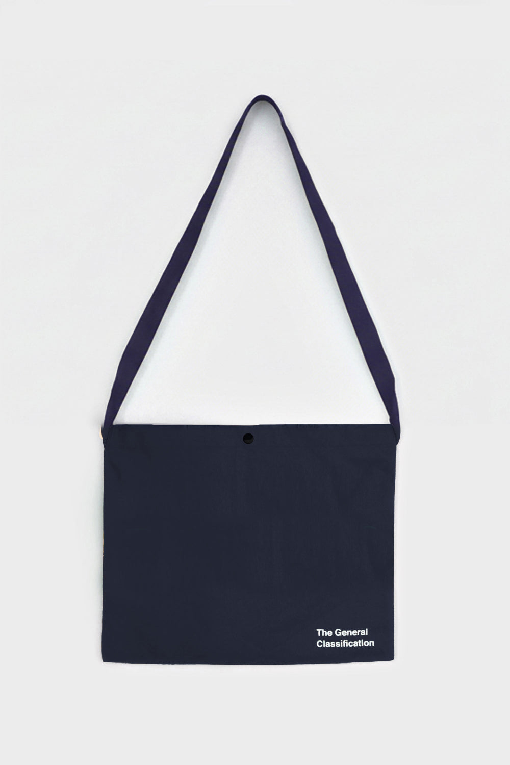 A dark navy blue shoulder bag with a matching strap, featuring the words 'BEER BAG' printed in bright green across the front, and small white text reading 'The General Classification' in the bottom right corner. The bag is displayed flat against a light gray background.