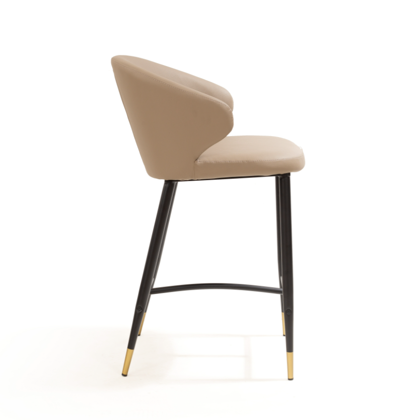 Beige bar stool with black legs and gold accents on a white background