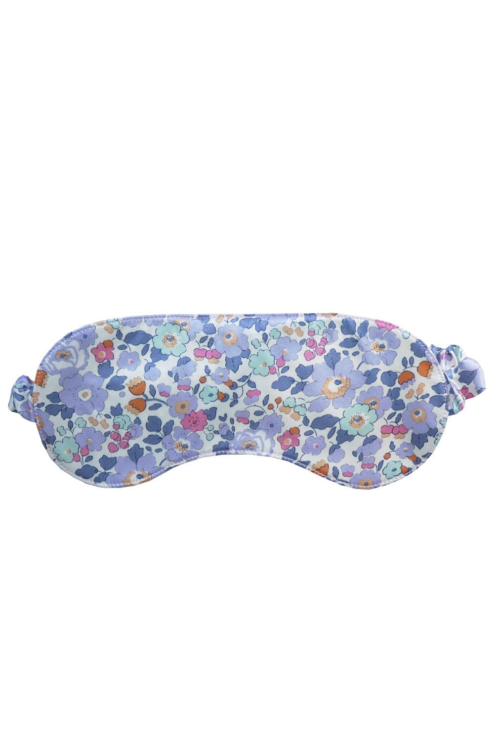 Floral Liberty patterned eye mask on a white background